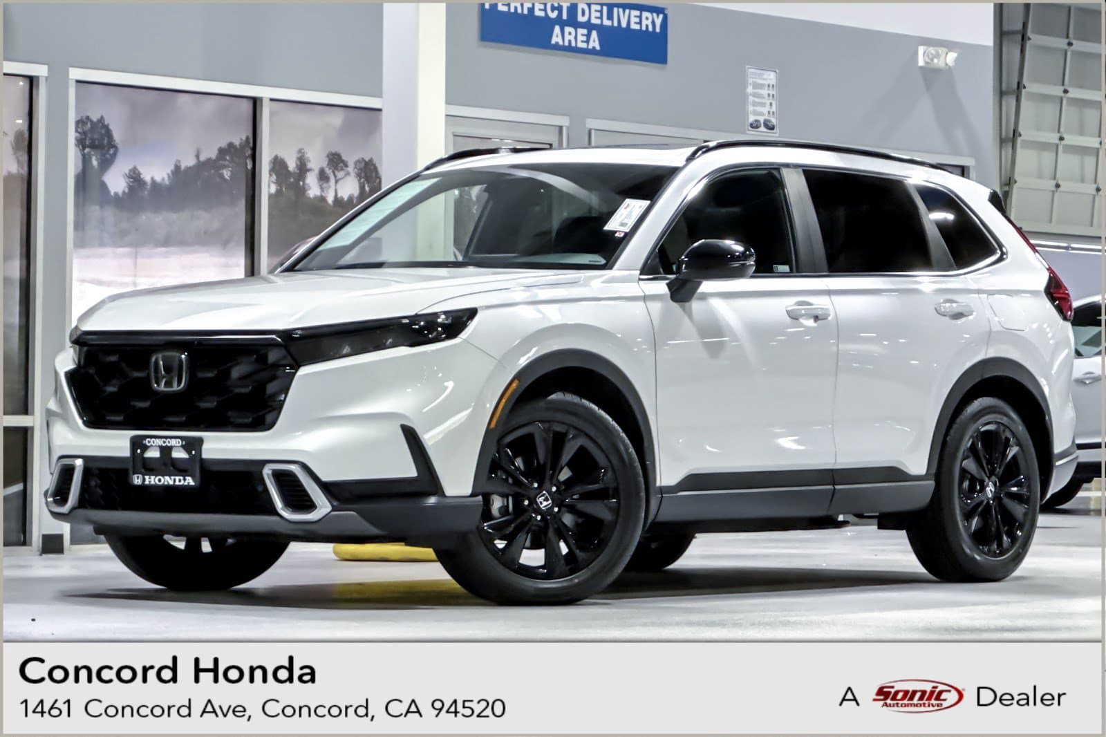 2024 Honda CR-V Hybrid Sport Touring — photo 1 of 7
