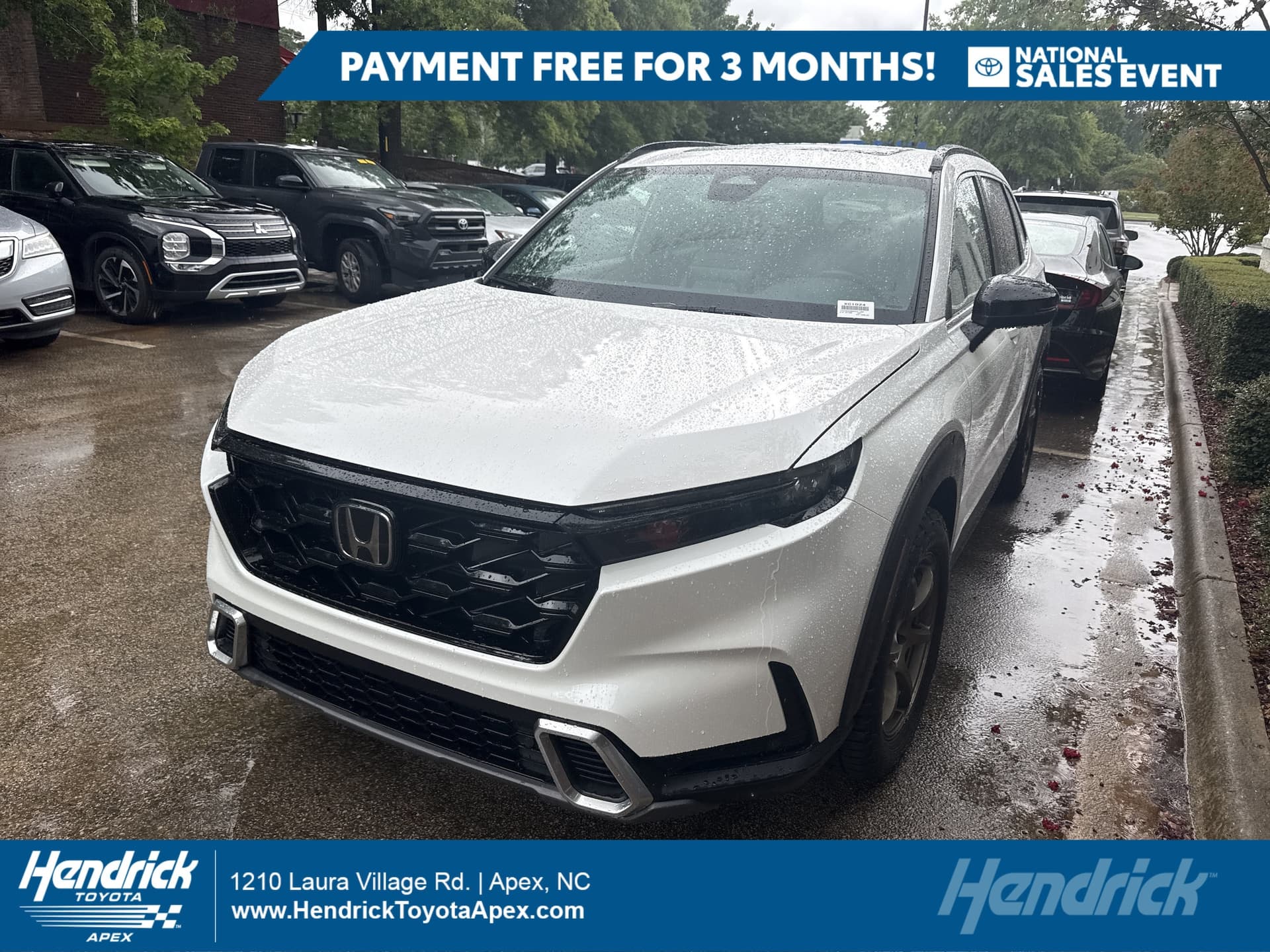 2025 Honda CR-V Hybrid Sport Touring — photo 1 of 12