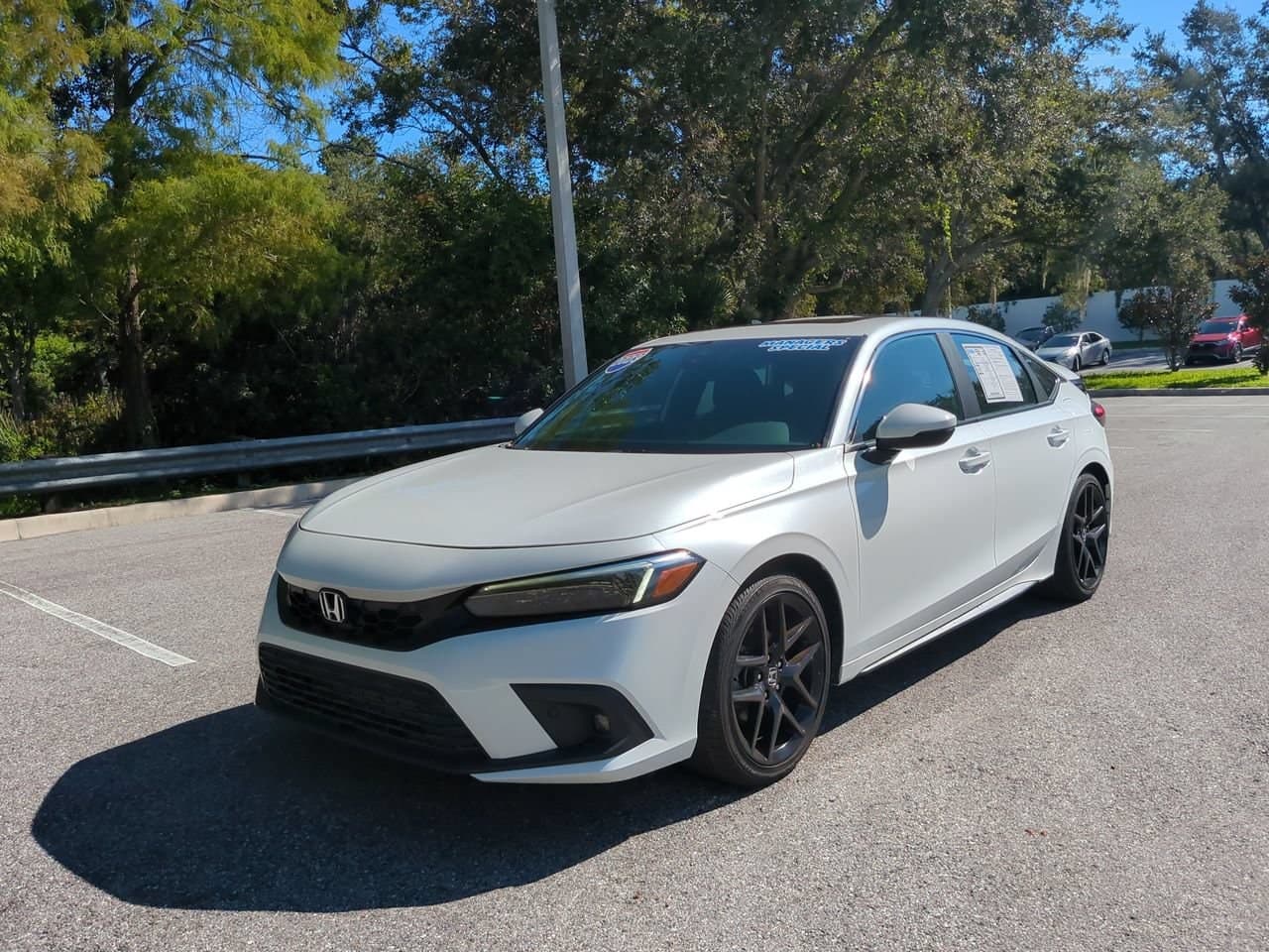 2023 Honda Civic Hatchback Sport Touring — photo 1 of 32