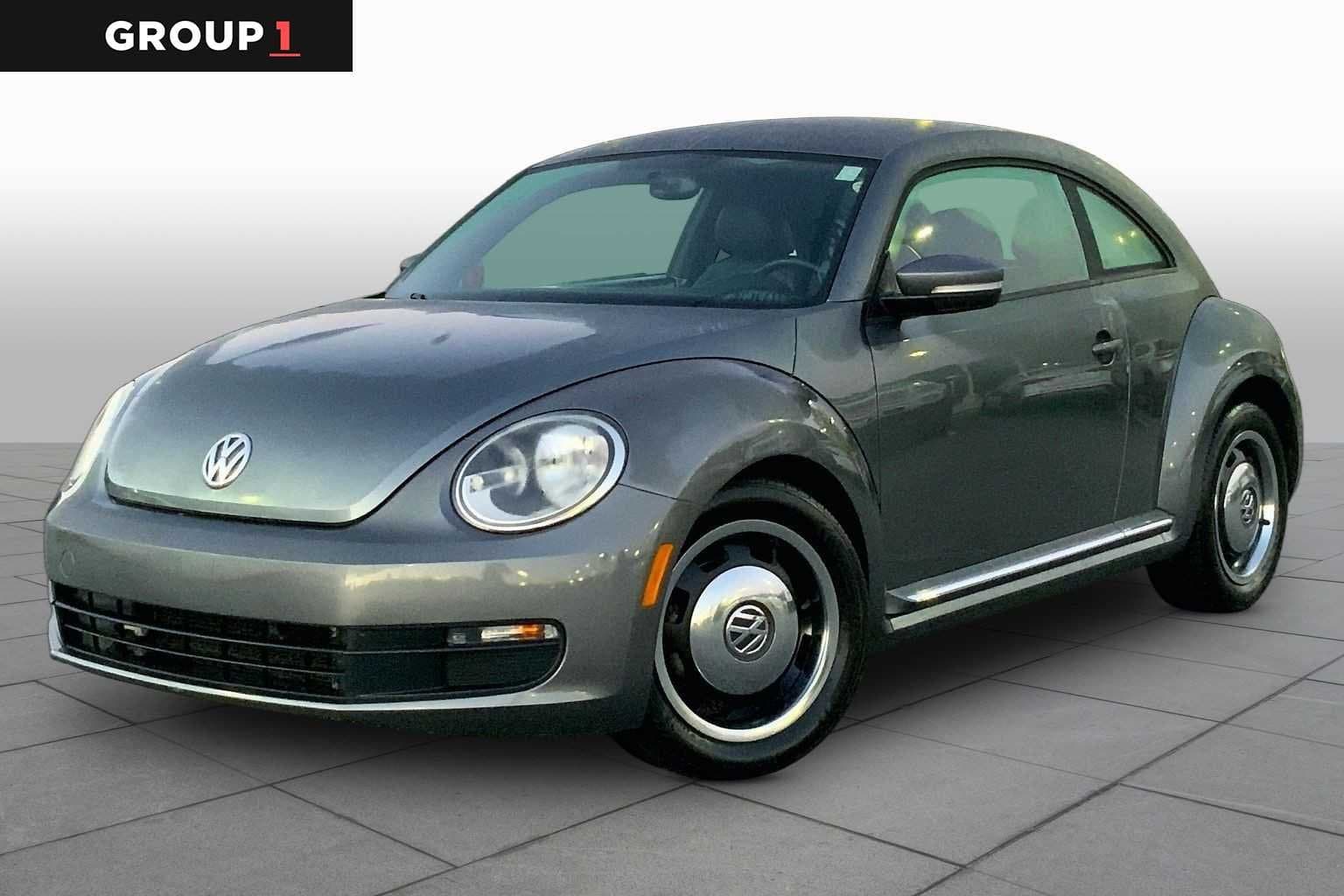 2012 Volkswagen Beetle 2.5L w/Sound/Nav PZEV — photo 1 of 27